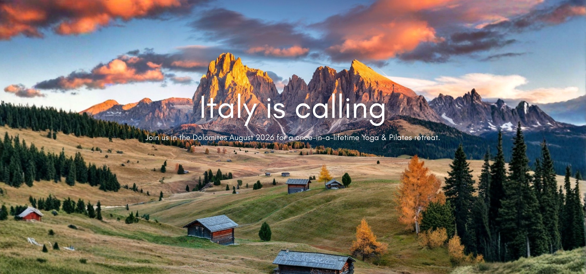 Two women practicing partner Pilates on mats at Ekam Yoga & Pilates studio in Newport Beach California